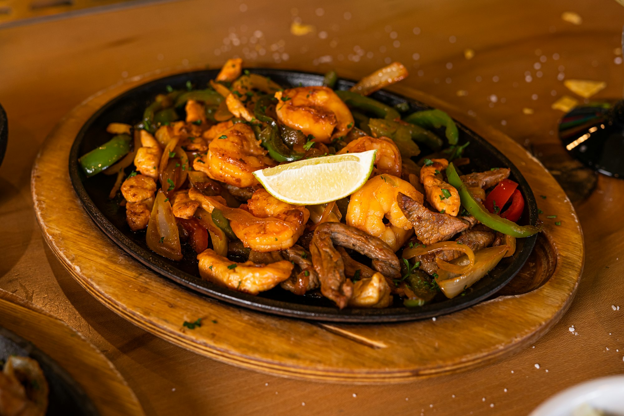 Sizzling mixed fajitas fresh off the grill at Nacho's Cantina & Grill