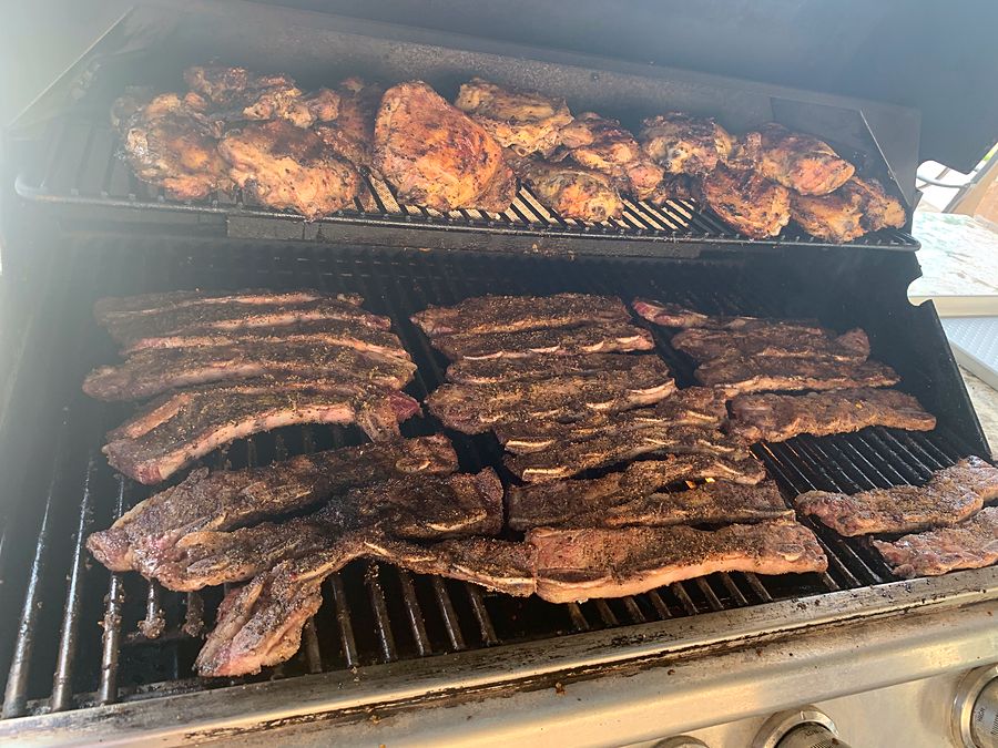 Chicken and steak on the Nacho's catering grill
